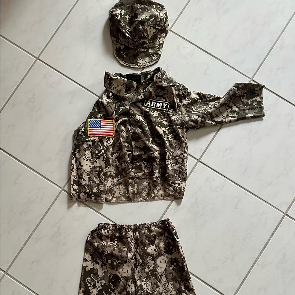 SOLD!!!   Child’s size M Army camouflage outfit. Includes cap, pants & shirt